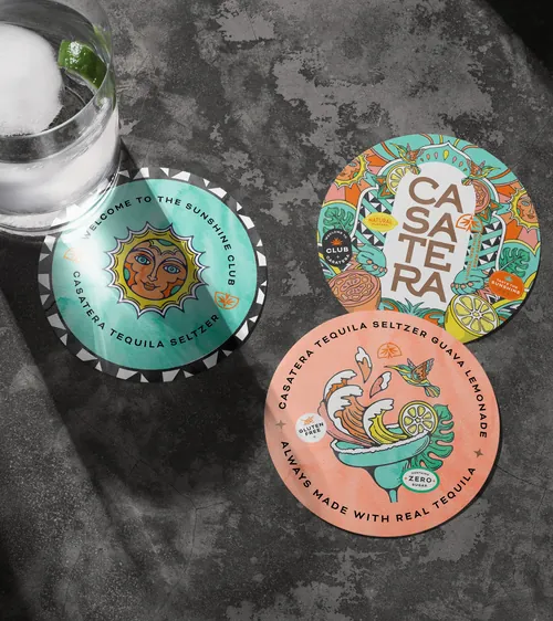 Three Casaterra tequila seltzer caps with vibrant artistic illustrations