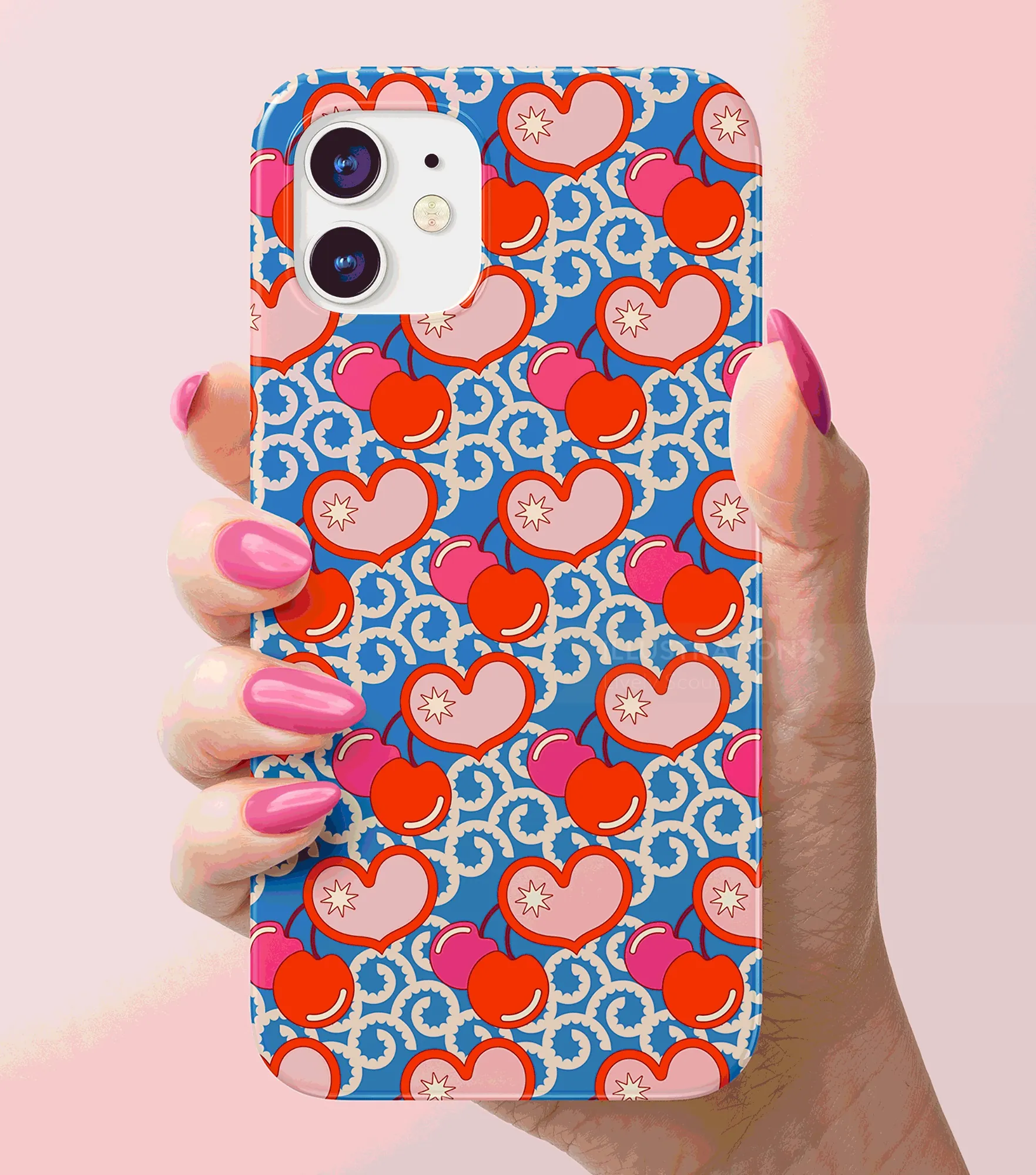 Lively Scout red heart pattern phone case held in a hand