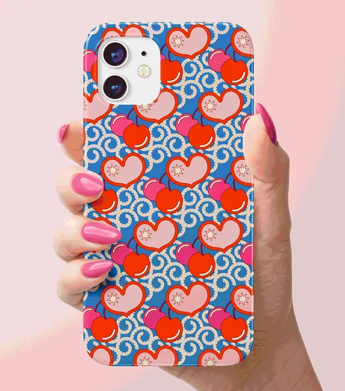 Lively Scout red heart pattern phone case held in a hand