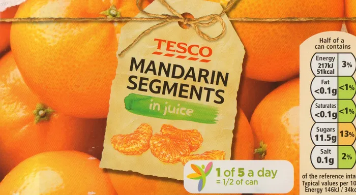 Poster design of Tesco Mansarin Segments in juice 