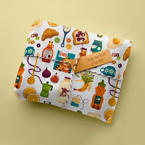 Fabric pouches with kitchen-themed patterns and a wooden tag by Luiza Laffitte
