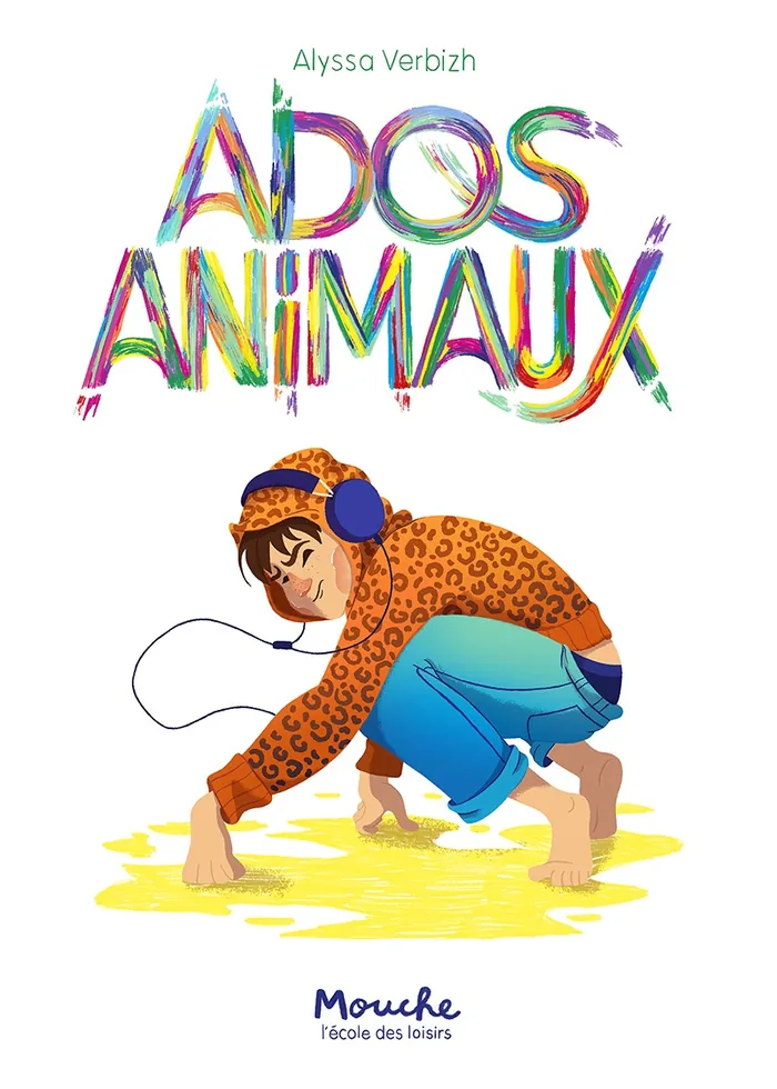 Child in leopard print hoodie with headphones crouching on yellow ground