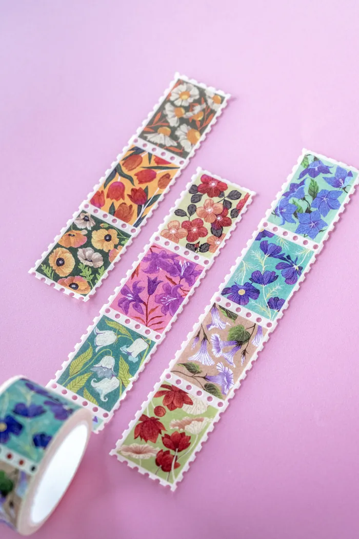Decorative floral patterned tape strips by Luiza Laffitte on pink background
