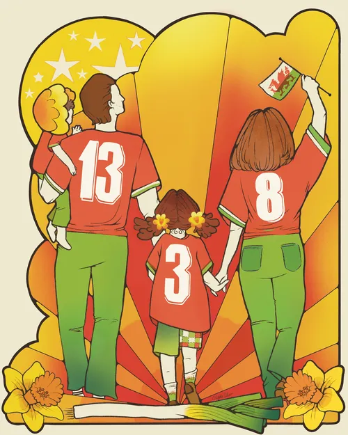 Famille de supporters de l'équipe féminine galloise de rugby tenant des jonquilles (photo de Lydia Silver)