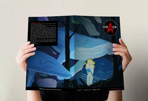 Hands holding an open book featuring large whale illustrations
