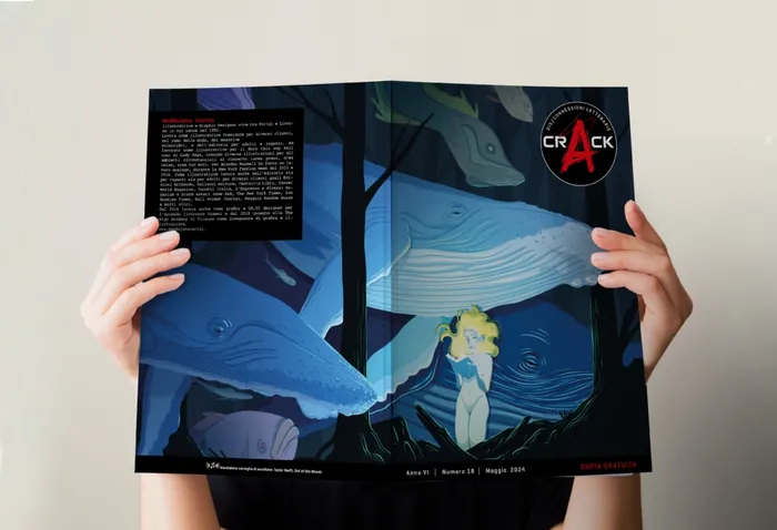 Hands holding an open book featuring large whale illustrations