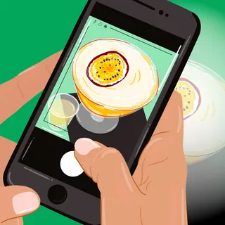 Hands holding smartphone taking photo of coffee cup, illustration by Mallory Heyer