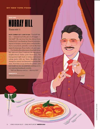 Murray Hill in pink suit eating spaghetti at a table with rose