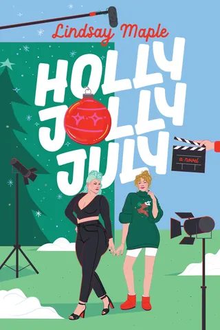 Two women posing on a holiday-themed film set with Christmas decorations