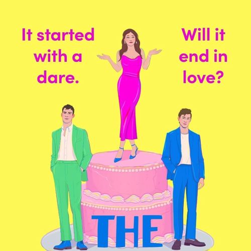 Woman in pink dress standing on cake between two men in suits