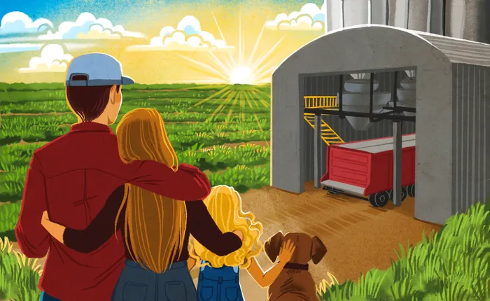 Family and dog looking at sunrise near a barn and tractor on a farm.