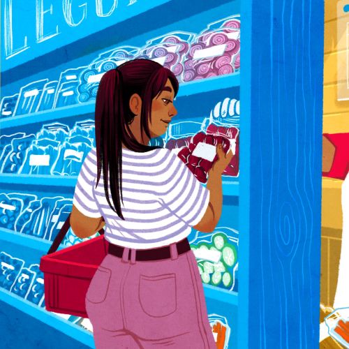 Woman buying packaged meat from market vendor behind counter.