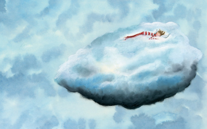雲の上で寝ている子供