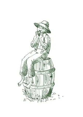 Boy playing harmonica on barrel outdoors by Marieke Nelissen