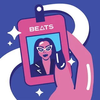 Hand holding a pink Beats headphone case with a photo of a person