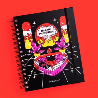 Spiral notebook with colorful surreal illustration and Spanish text cover.