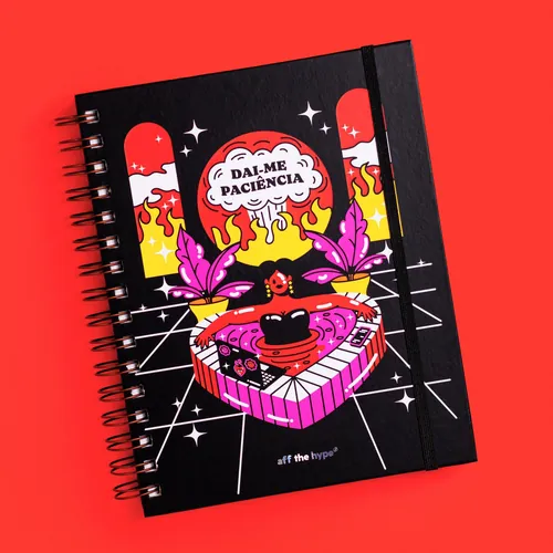 Spiral notebook with colorful surreal illustration and Spanish text cover.
