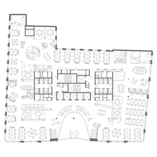 Office floor plan showing desks, meeting rooms, and common areas layout.