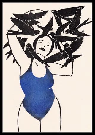 Woman in blue swimsuit with black birds flying around her