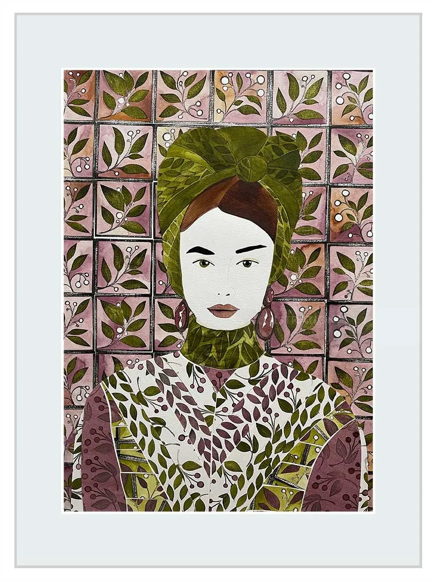 Woman wearing green headwrap and leafy patterned garment