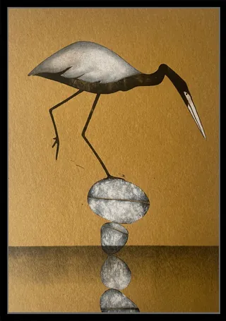 Stylized heron bird balancing on stacked stones with reflection