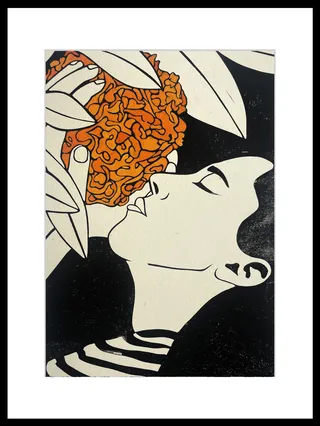 Person with closed eyes smelling a vibrant orange flower.