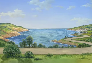 Coastal scene with winding road, greenery, and calm sea under blue sky.