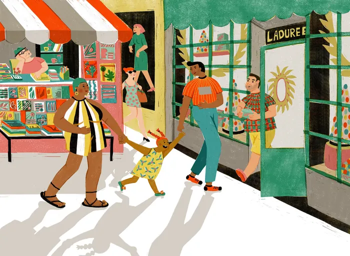 People walking and window shopping on a sunny street with shops