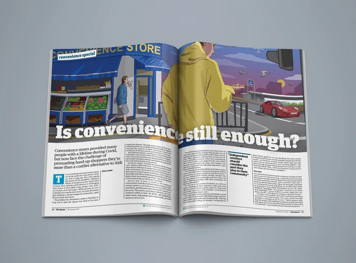 Person in yellow hoodie facing a convenience store at dusk