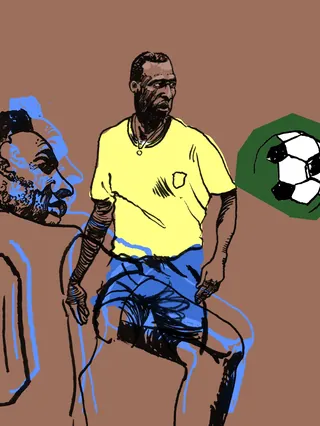 Drawing of soccer player in yellow shirt and blue shorts with soccer ball