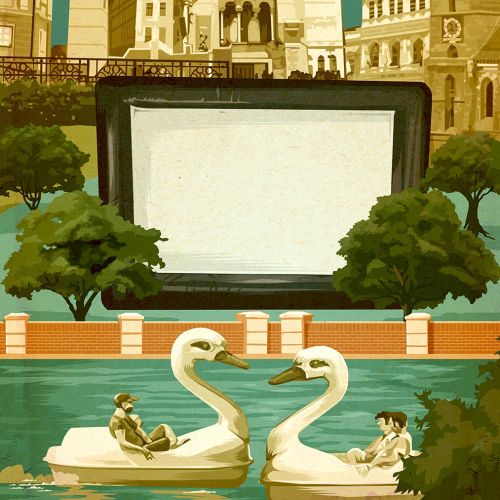 People enjoying swan boats in water park