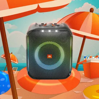 JBL portable speaker with multicolor LED lights on a beach