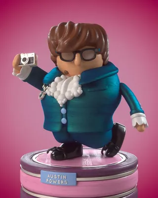Austin Powers figurine with glasses and camera by Maurice Baltissen