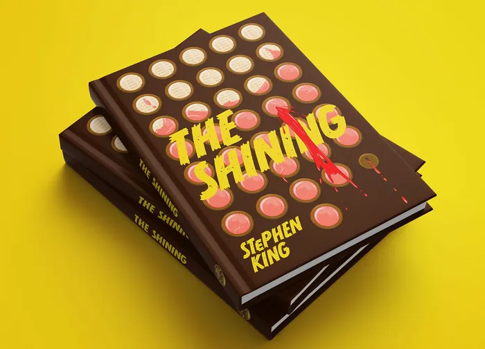 Book cover of The Shining by Stephen King with bold yellow title