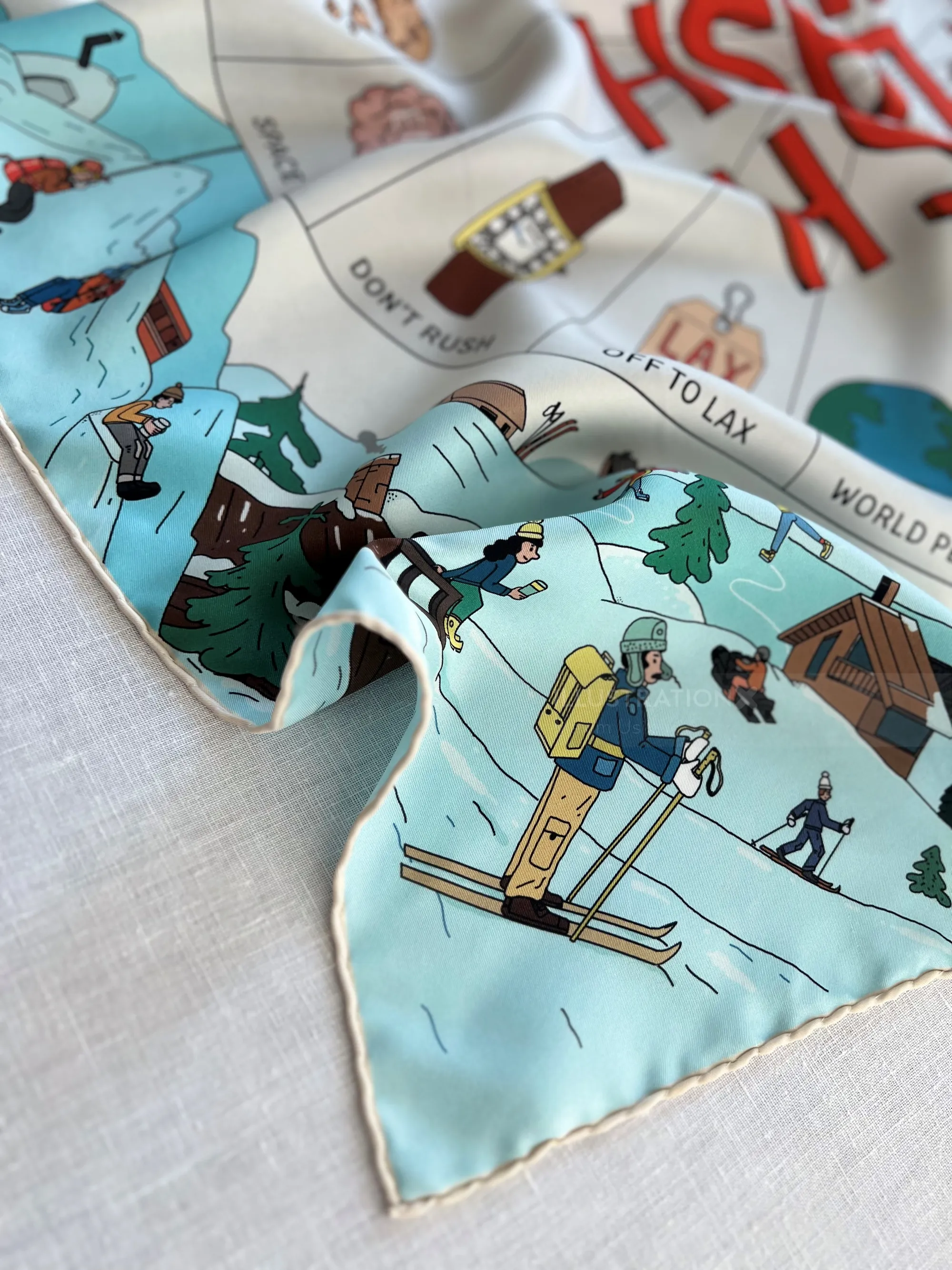Silk scarf showing winter sports scenes by Maxim Usik