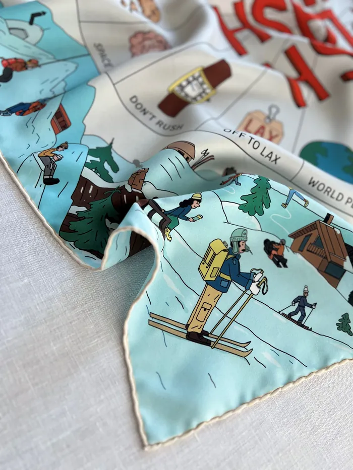 Silk scarf showing winter sports scenes by Maxim Usik