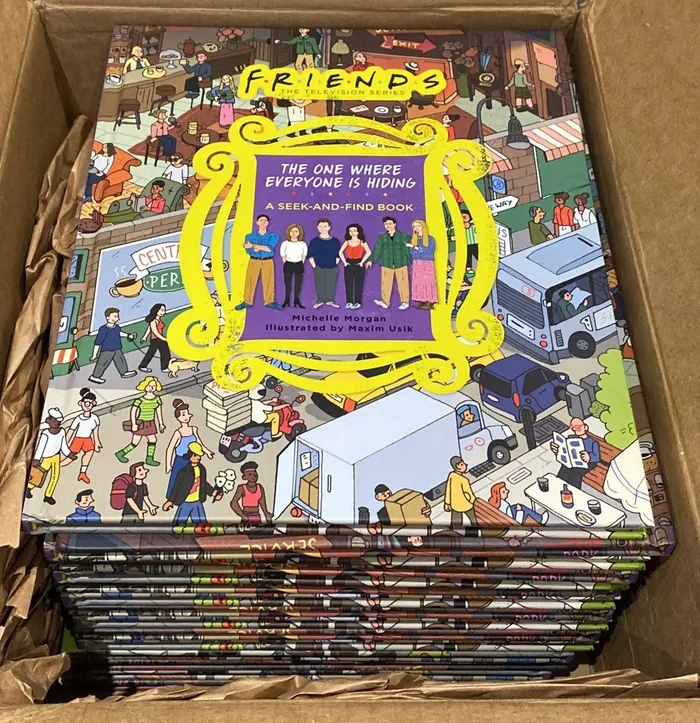 Friends seek-and-find book with cartoon city scene and characters