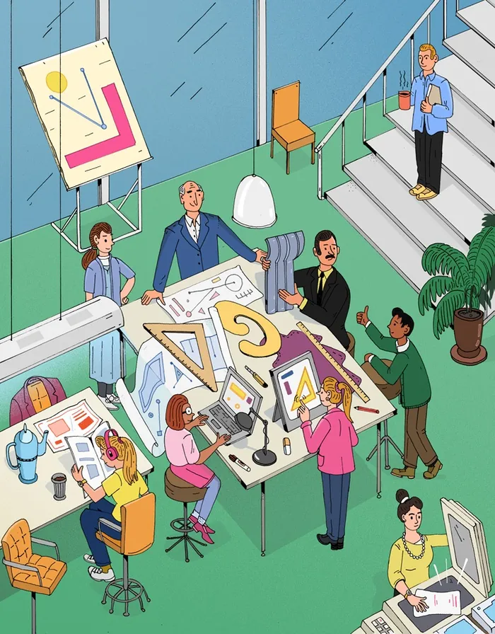 Team of designers working together on creative projects in office