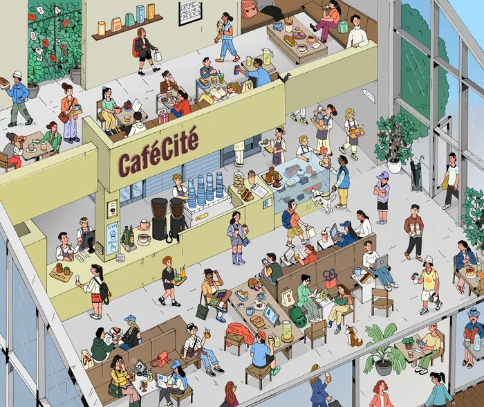 Interior of CaféCité with customers drinking coffee and chatting in a lively atmosphere