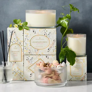Williams Sonoma Champagne Spritz scented candles with floral decor