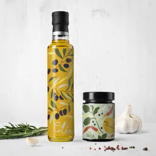 Olive oil bottle and seasoning jar with garlic and herbs