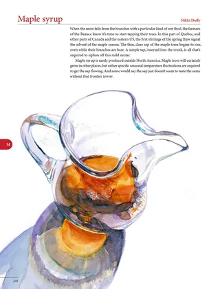 Glass pitcher filled with maple syrup against white background by Michael Frith