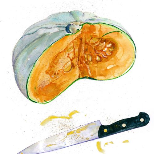 Halved green pumpkin with seeds and kitchen knife on white background