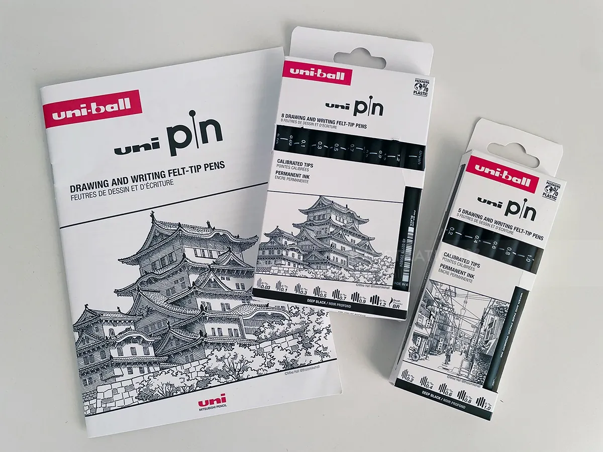 Uni-ball pin fine-tip pen sets with detailed building illustration