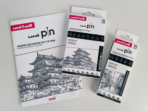 Uni-ball pin fine-tip pen sets with detailed building illustration