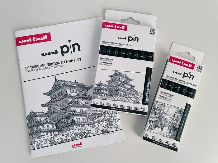 Uni-ball pin fine-tip pen sets with detailed building illustration