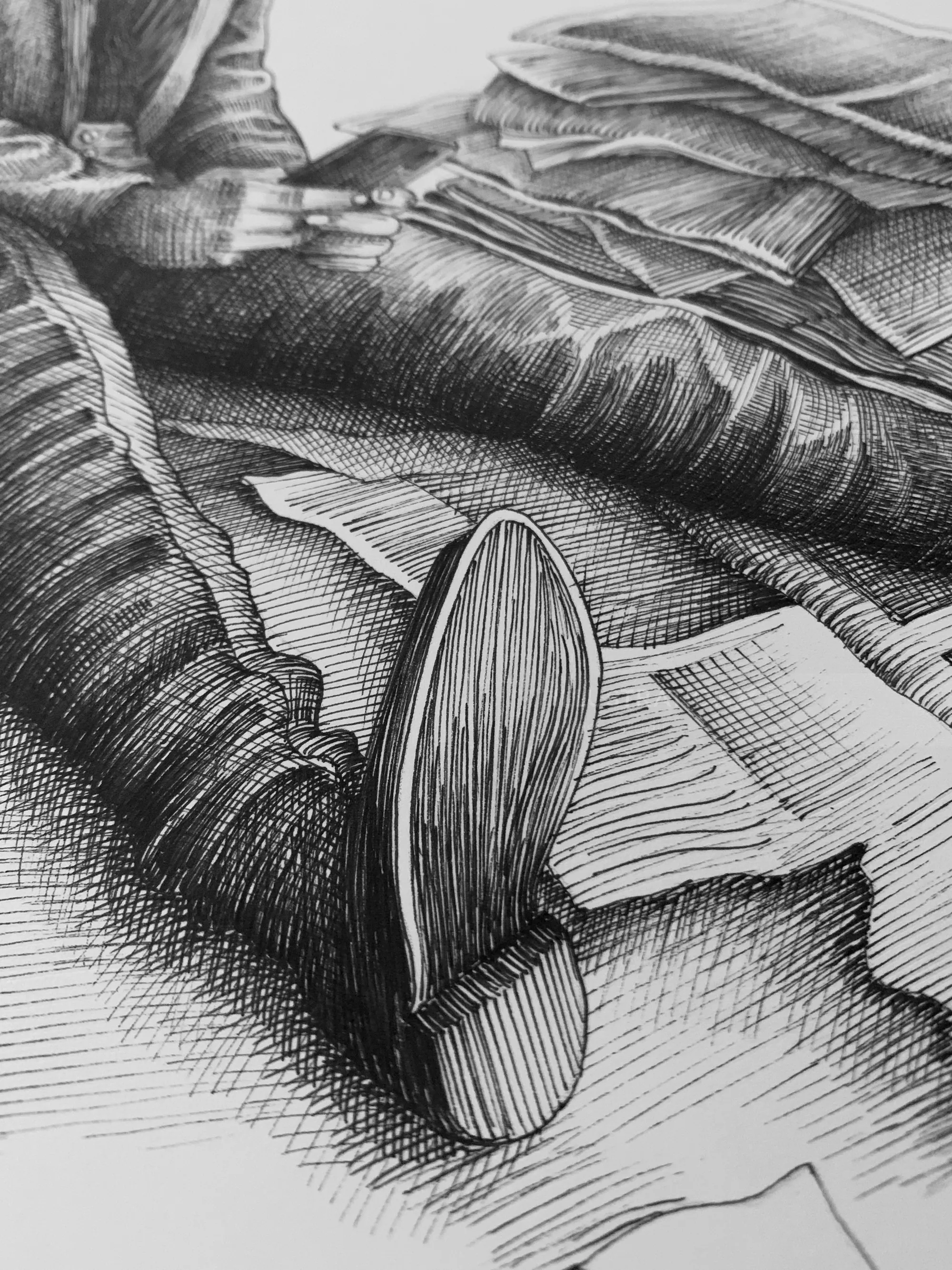 Close-up drawing of person lying with papers scattered on floor by Miosis