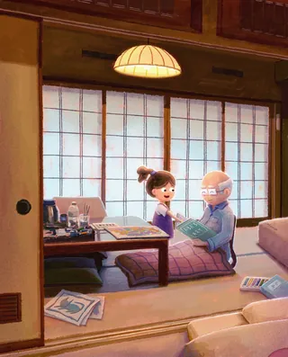 Young girl and grandpa reading together in a cozy room
