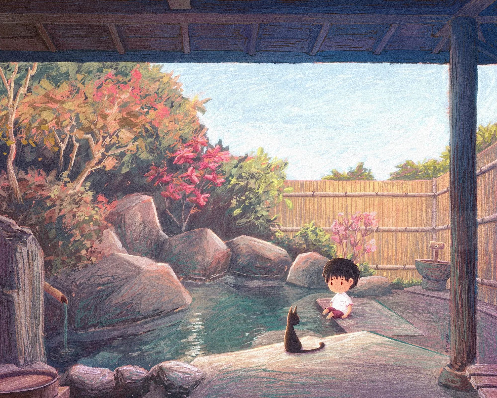 Boy sitting near pond with a black cat in a garden