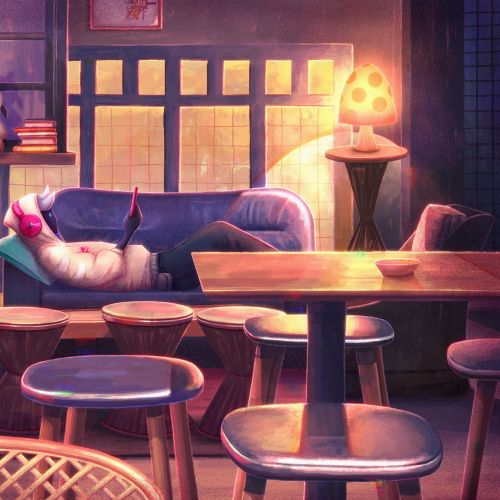 Cozy cafe interior with warm lighting and empty tables